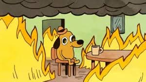 Question Hound sitting in a burning room in the This Is Fine comic